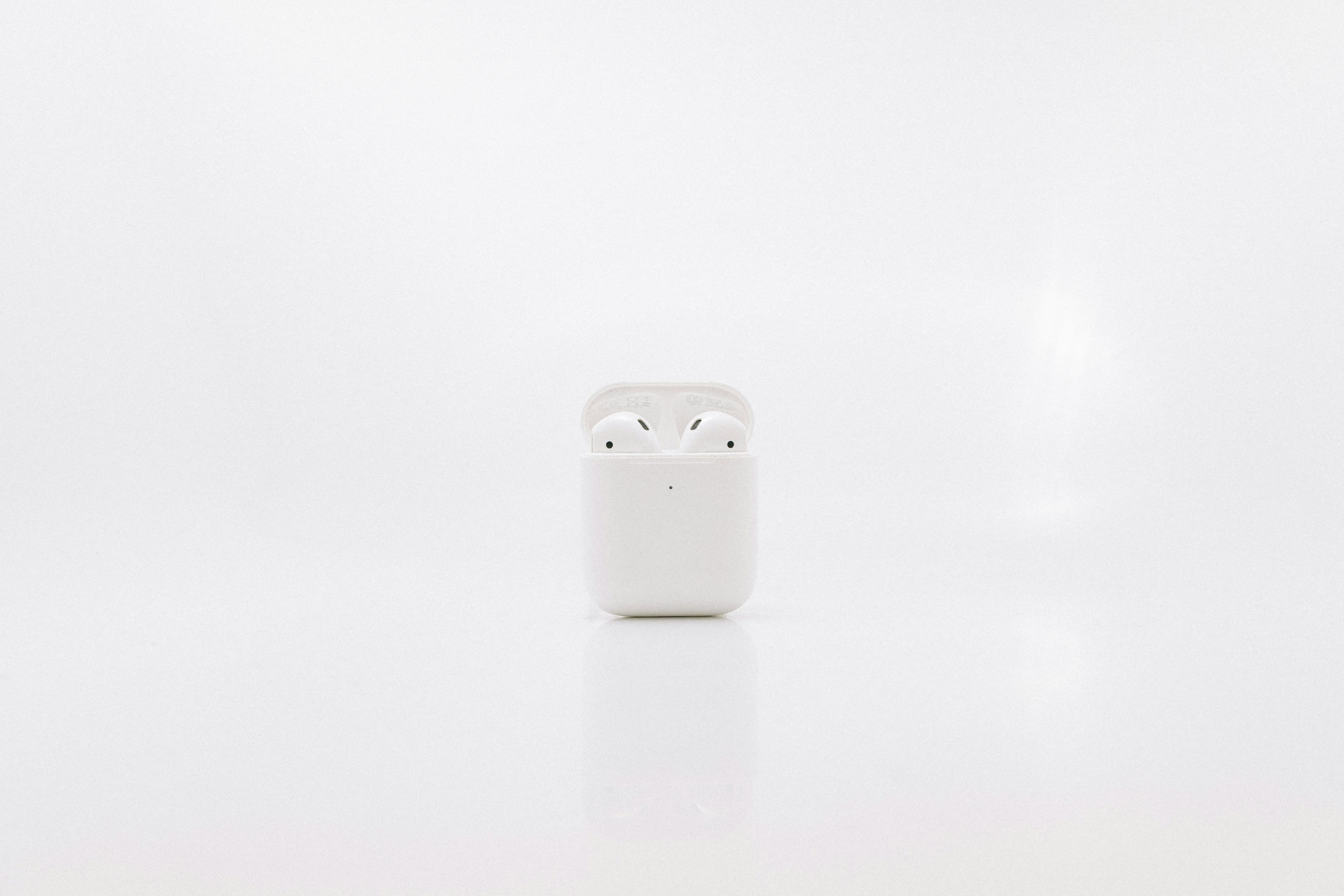 White boAt Airdopes wireless earbuds in open charging case